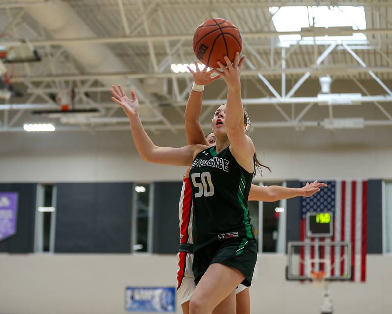 Providence's Taylor Healy (50) puts in a layup in the WJOL Tournament Championship game. Nov 18, 2023.