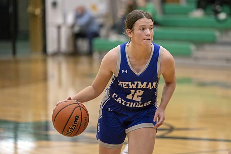 Newman’s Lucy Oetting looks to pass against Rock Falls Thursday, Nov. 16, 2023.