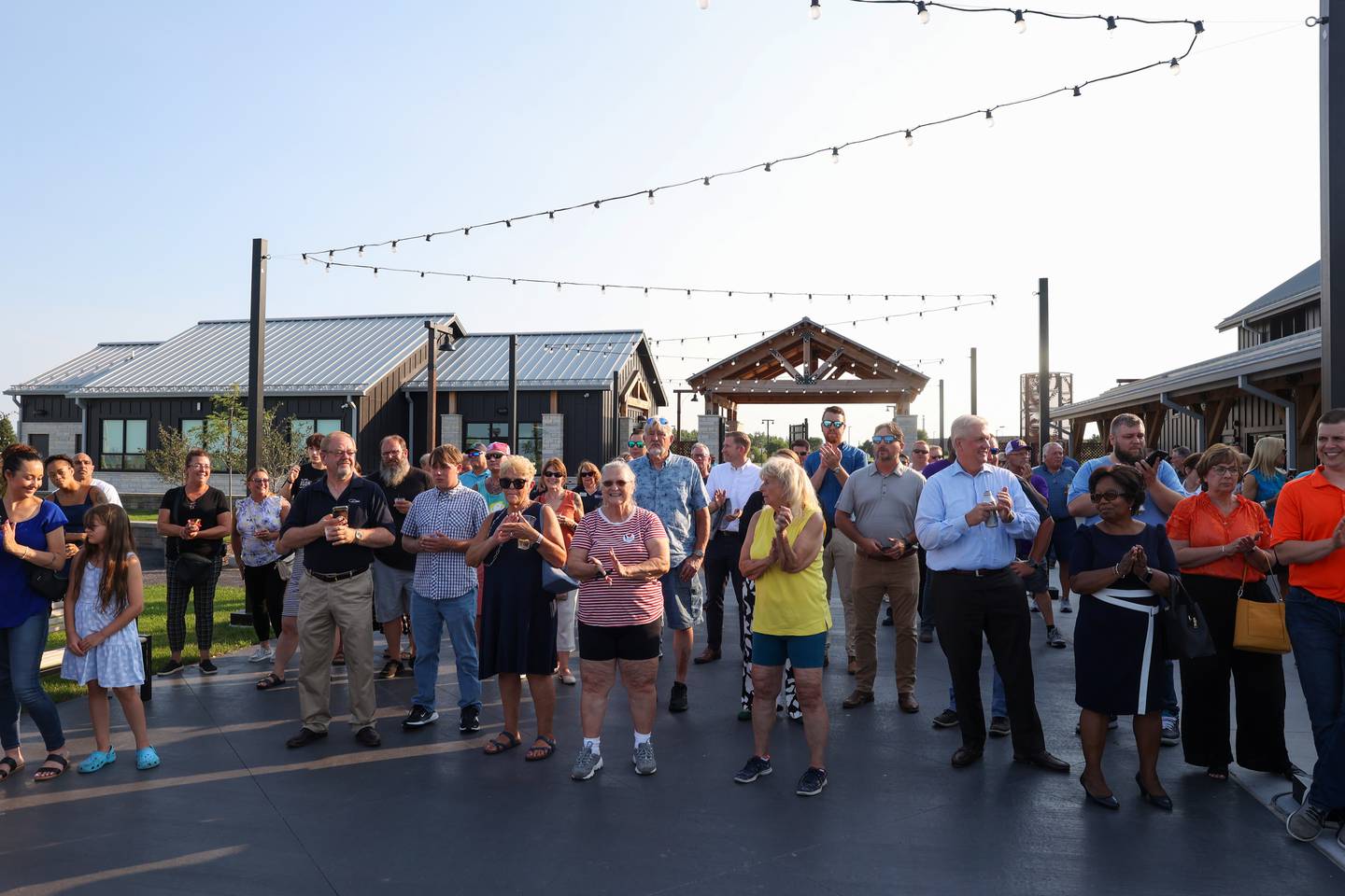 Attendees applaud as the ribbon is cut at Bradley's 315 Sports Park during a Bradley Business After Hours event on Tuesday, July 29, 2025.