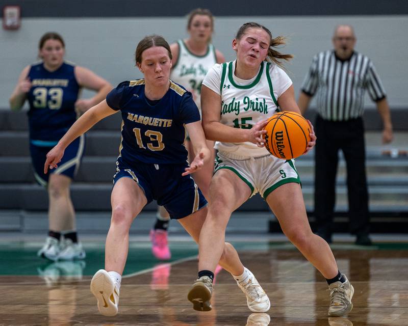 Kylee Rowley (15) of Seneca runs with ball as Emily Ryan-Adair (13) of Marquette defends on Monday, November 17, 2025 at Seneca High School in Seneca.