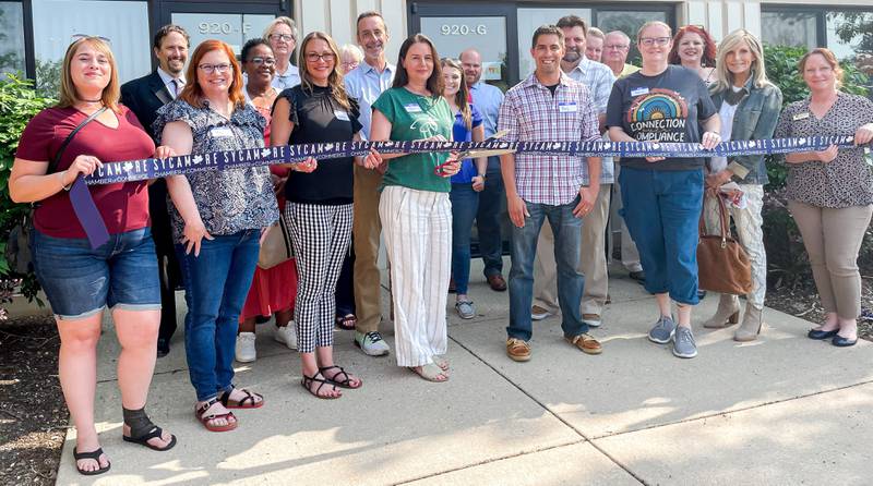 The Sycamore Chamber of Commerce welcoming Momentum with a ribbon-cutting.