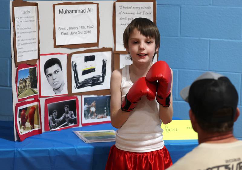 Third grader Kaleb Jaeger, playing Muhammed Ali, gives his presentation during the Hinckley Big Rock Elementary School Wax Museum Thursday, March 13, 2025, at the school in Hinckley.