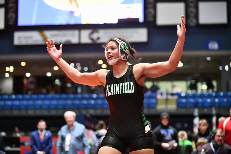 Alicia Tucker of Plainfield Central celebrates her 170-pound championship victory in the IHSA Girls Individual State Finals on Saturday, March 1. Tucker claimed first place over August Rottmann of Highland.