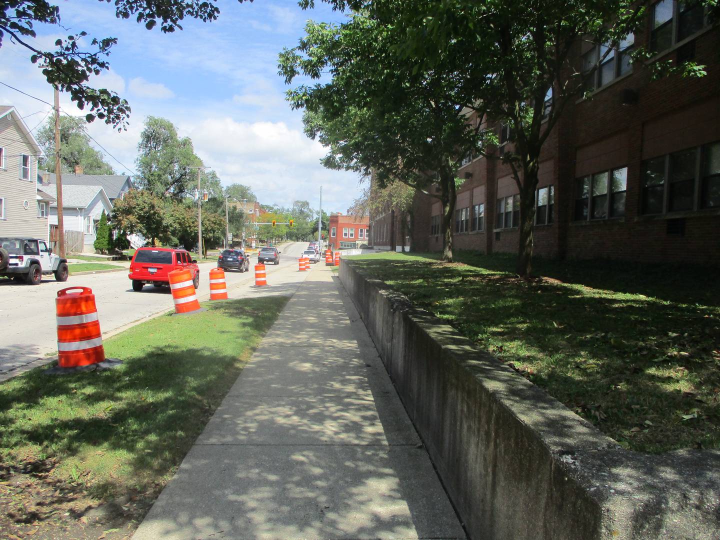 Construction cones were set outside the old Joliet Catholic High School building on Wednesday in preparation for a Hickory Street lane closure for demolition of the school gym. Aug. 28, 2024