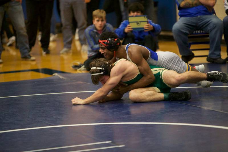 Joliet Central's Jermaine Cooper competes with Lane Tech's  Vermaal VanderBrug in the 144 lb. class at the Newbill Invitational on Saturday, Jan.6,2024 in Geneva.