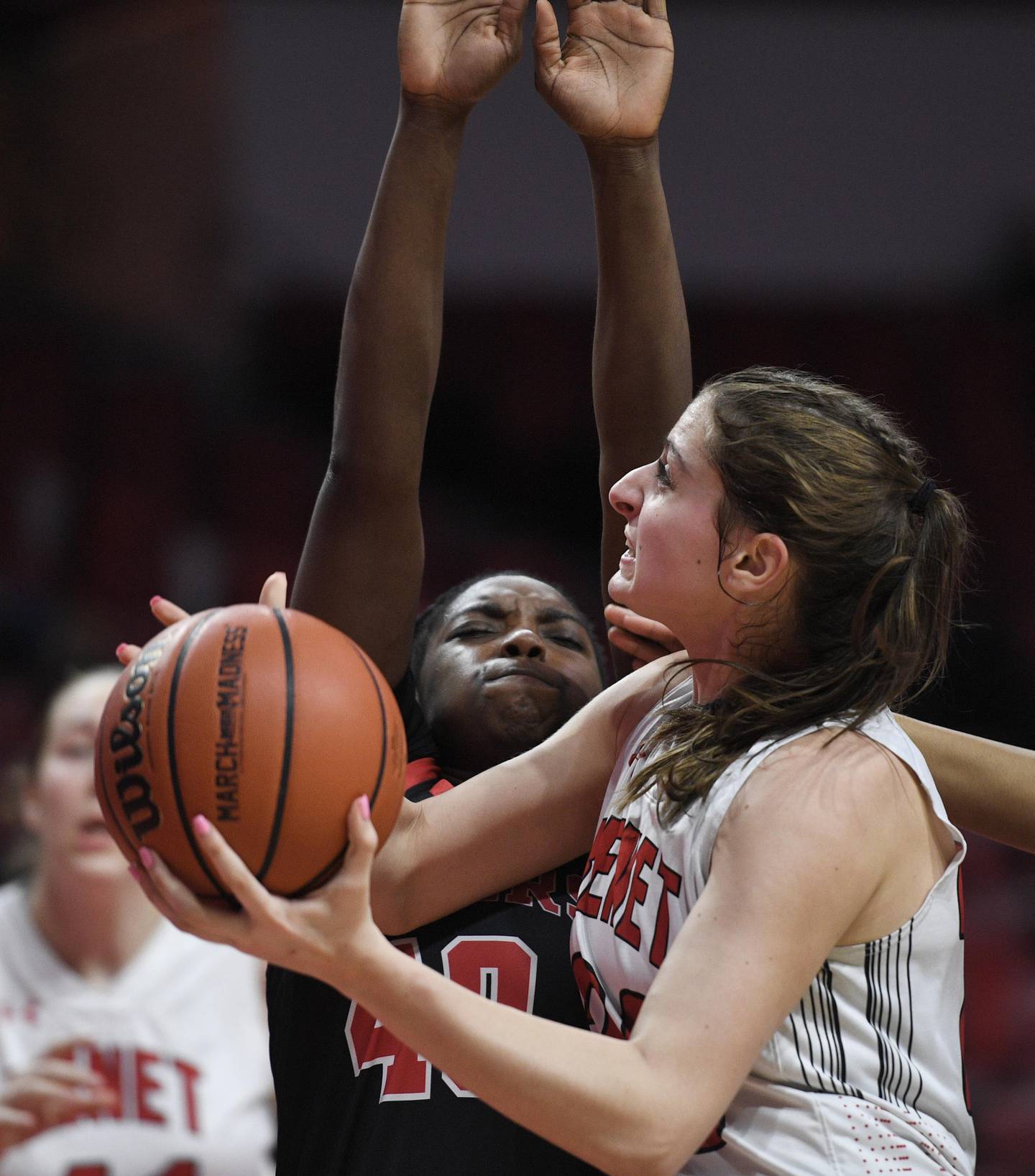 Benet Academy’s Olympia Kokkines looks for the hoop as Bolingbrook's Jasmine Jones defends in the Class 4A state 3rd place game at Redbird Arena at Illinois State University in Normal on Friday, March 4, 2022.