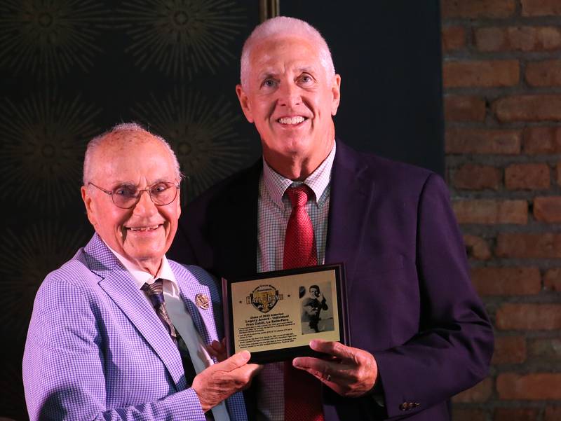 Joe Cahill, son of La Salle-Peru alumnus Fran Cahill, poses with emcee Lanny Slevin during the 2025 Shaw Media Illinois Valley Sports Hall of Fame at the Auditorium Ballroom in La Salle. Cahill was one of two recipients this year of our Legacy Individual Award.