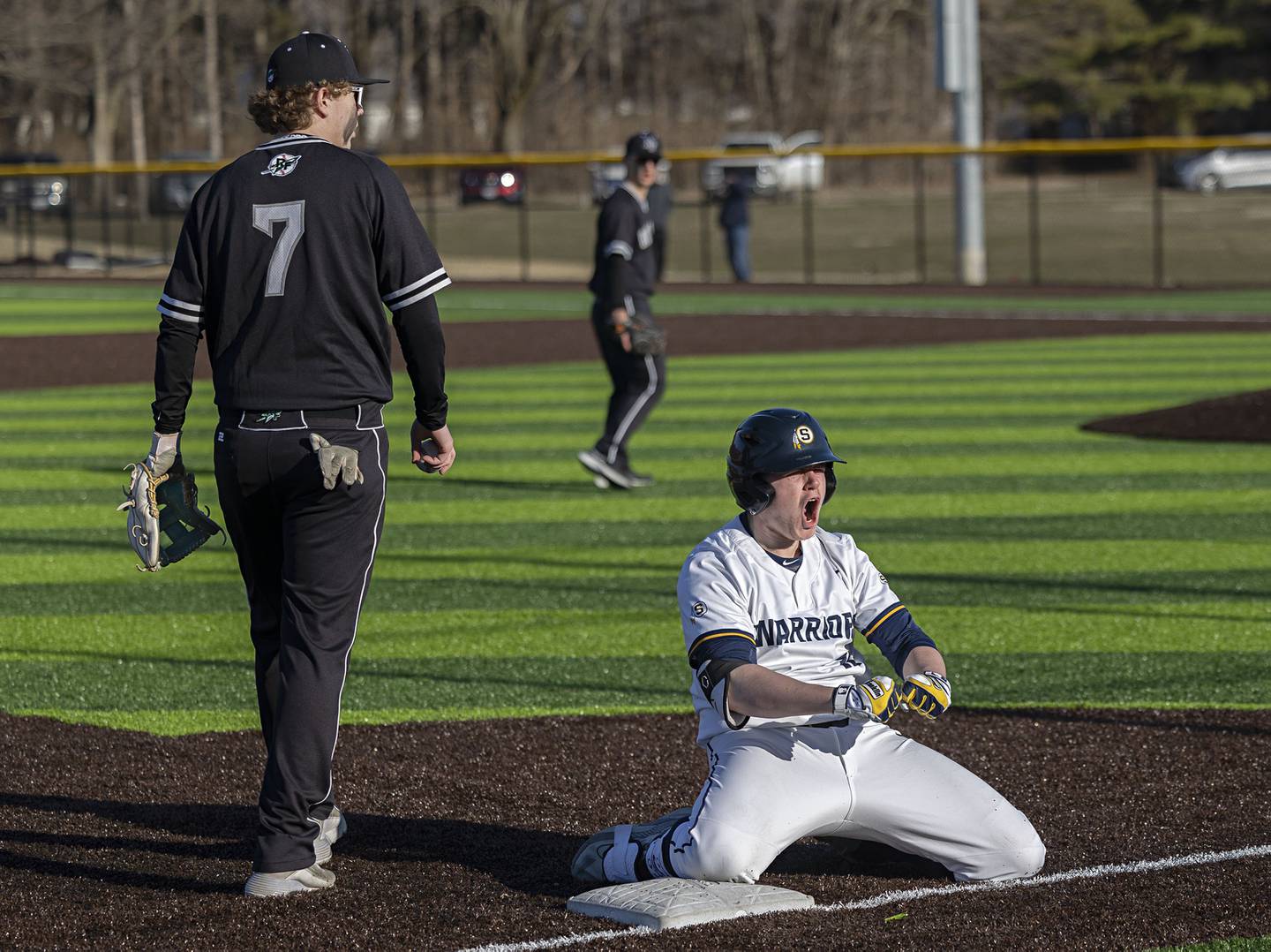 Sterling’s Drew Nettleton celebrates his triple against Rock Falls Tuesday, March 28, 2023.