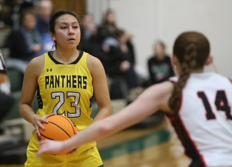 Putnam County's Valeria Villagomez looks to pass the ball around Amboy/Ohio's Jillian Anderson during the Class 1A Regional semifinal game on Tuesday, Feb. 18, 2025 at St. Bede Academy.