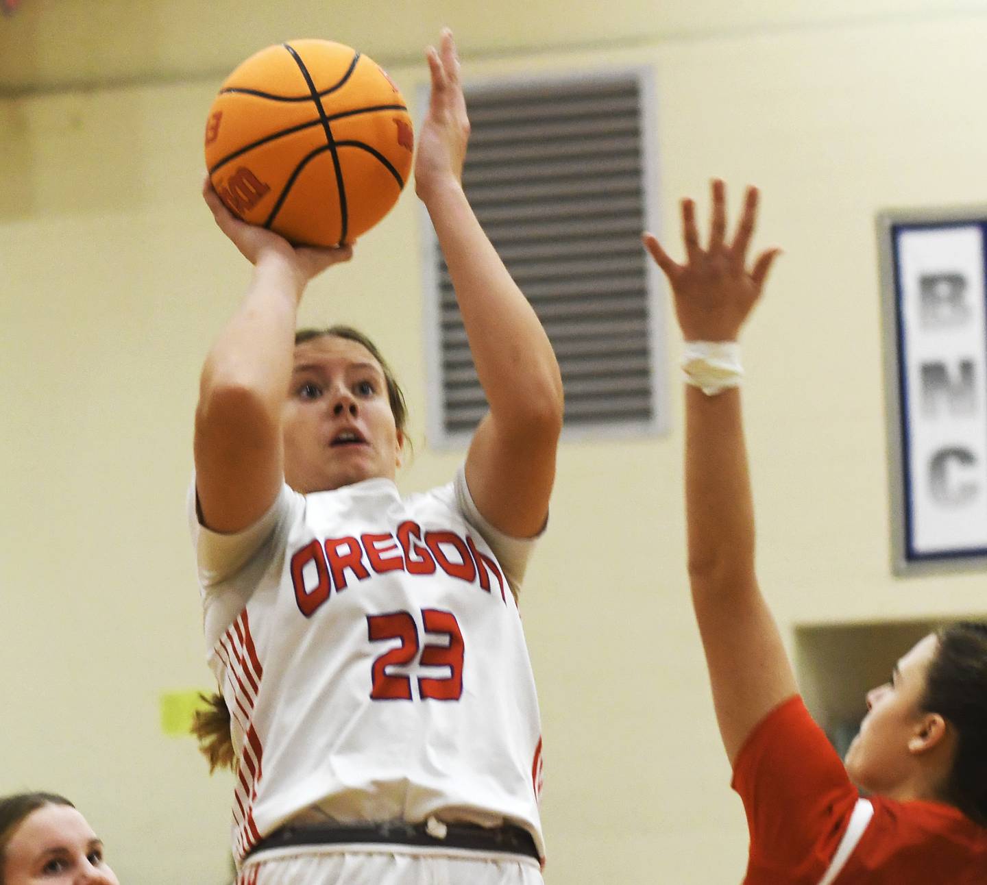 Oregon's Aniyah Sarver (23) puts up a shot against Aurora Christian at the Oregon Girls Tip-Off Tournament on Friday, Nov. 21, 2025 at the Blackhawk Center  in Oregon.