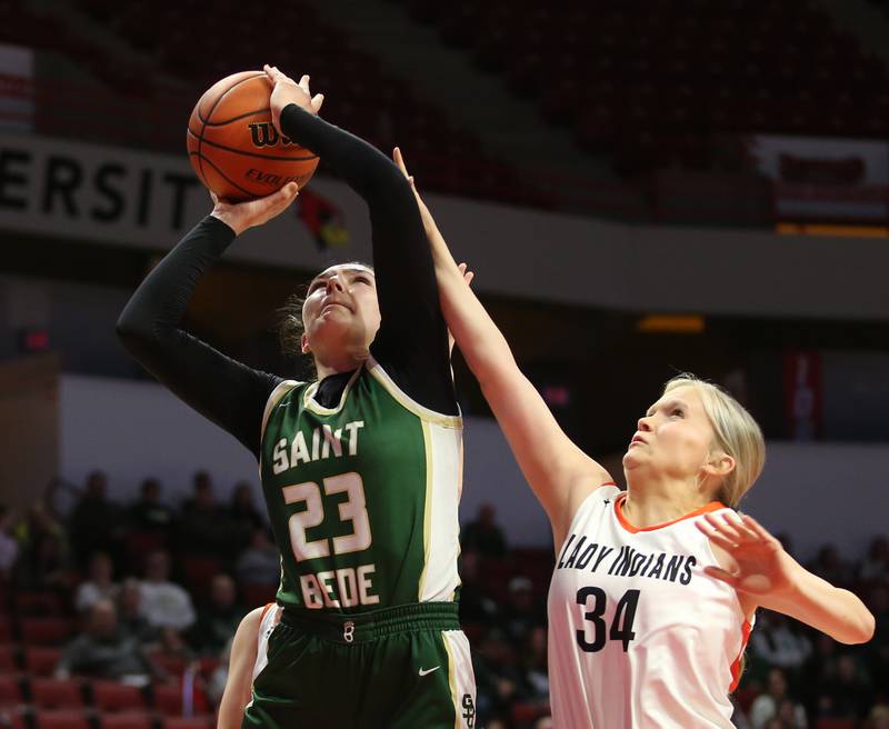 St. Bede's Ali Bosnich eyes the hoop over Skylie Klein during the Class 1A third-place game on Thursday, Feb. 29, 2024 at CEFCU Arena in Normal.