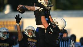 Warren plays through the grief, rolls Barrington 41-7