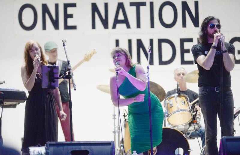 Three vocalists sing with Brass From The Past at the Jamboree Concert Series on Friday, Aug. 1, 2025 in Mt. Morris.
