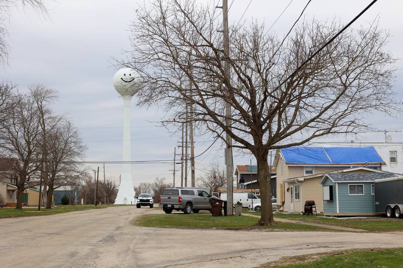 The Aroma Park water tower features a smiley face as seen on March 14, 2026, as homes undergo repairs following the March 10 tornado in Kankakee County.