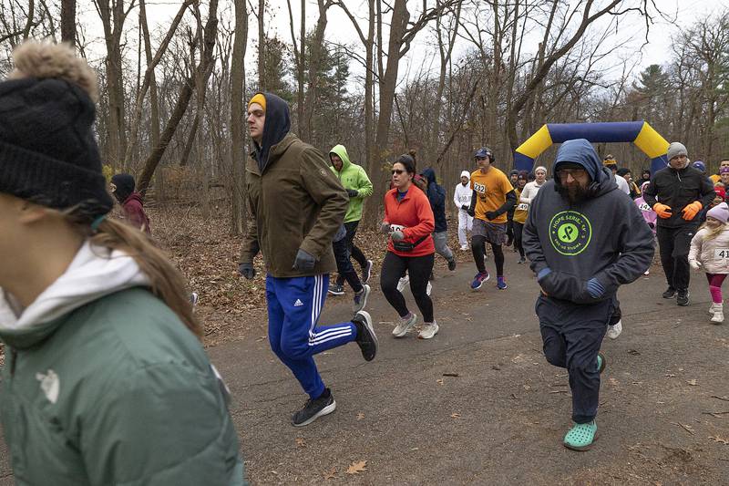 Participants head out for the run or walk Thursday, Nov. 28, 2024, during St. Anne’s Turkey Trot 5K in Dixon.