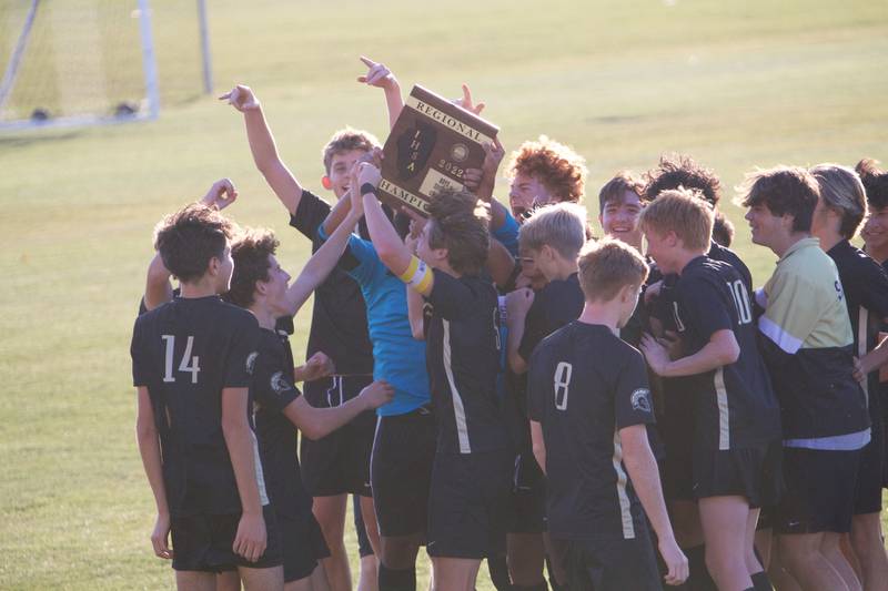 Sycamore celebrates the win over Kaneland at the Class 2A Regional Final on Saturday, Oct. 22,2022 in Sycamore.