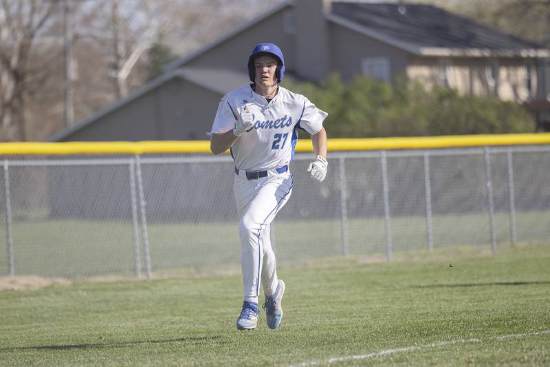 Newman’s Brendan Tunink rounds third base to score against Hall Monday, April 15, 2024 at Newman High School.