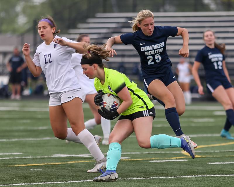 Downers Grove North's Elizabeth Reilly (28) blocks a kick on goal during Class 3A Addison Trail Regional final soccer match between Downers Grove South at Downers Grove North.  May 19, 2023.