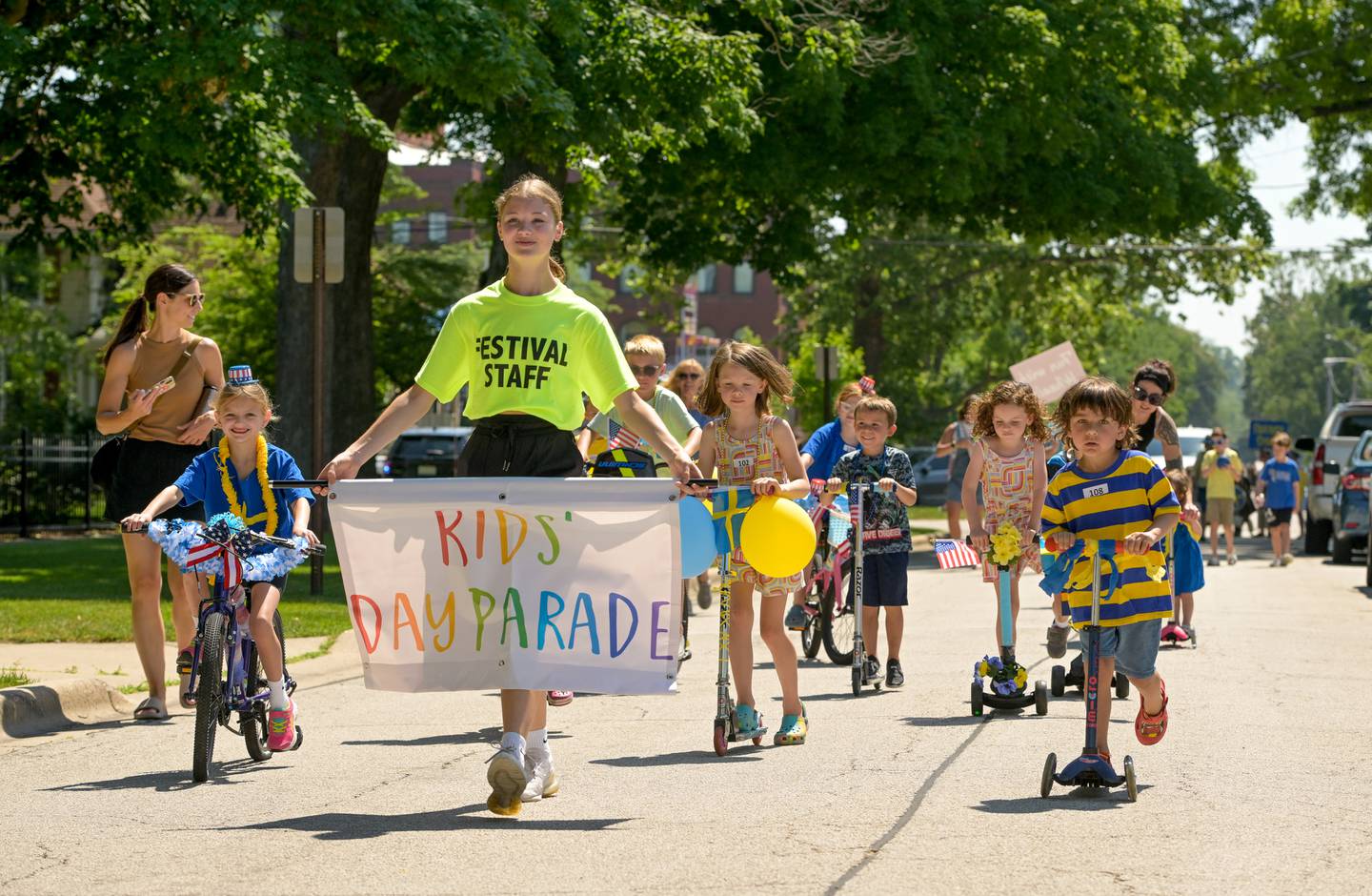 Swedish Days Kids Day Parade processes along Campbell Street in Geneva on Friday, June 21, 2024.