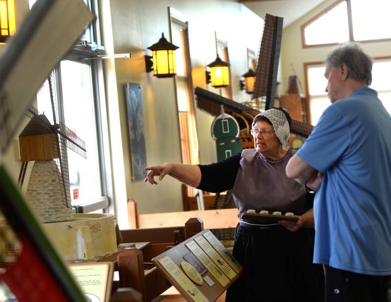 Kathy Bielema, a volunteer at the Windmill Cultural Center in Fulton, talks about the history and types of windmills as she gives a tour at the center during the 25th anniversary celebration of  Fulton's de Immigrant windmill Saturday, June 7, 2025. Tours of the windmill and center were two of the activities offered during the day.