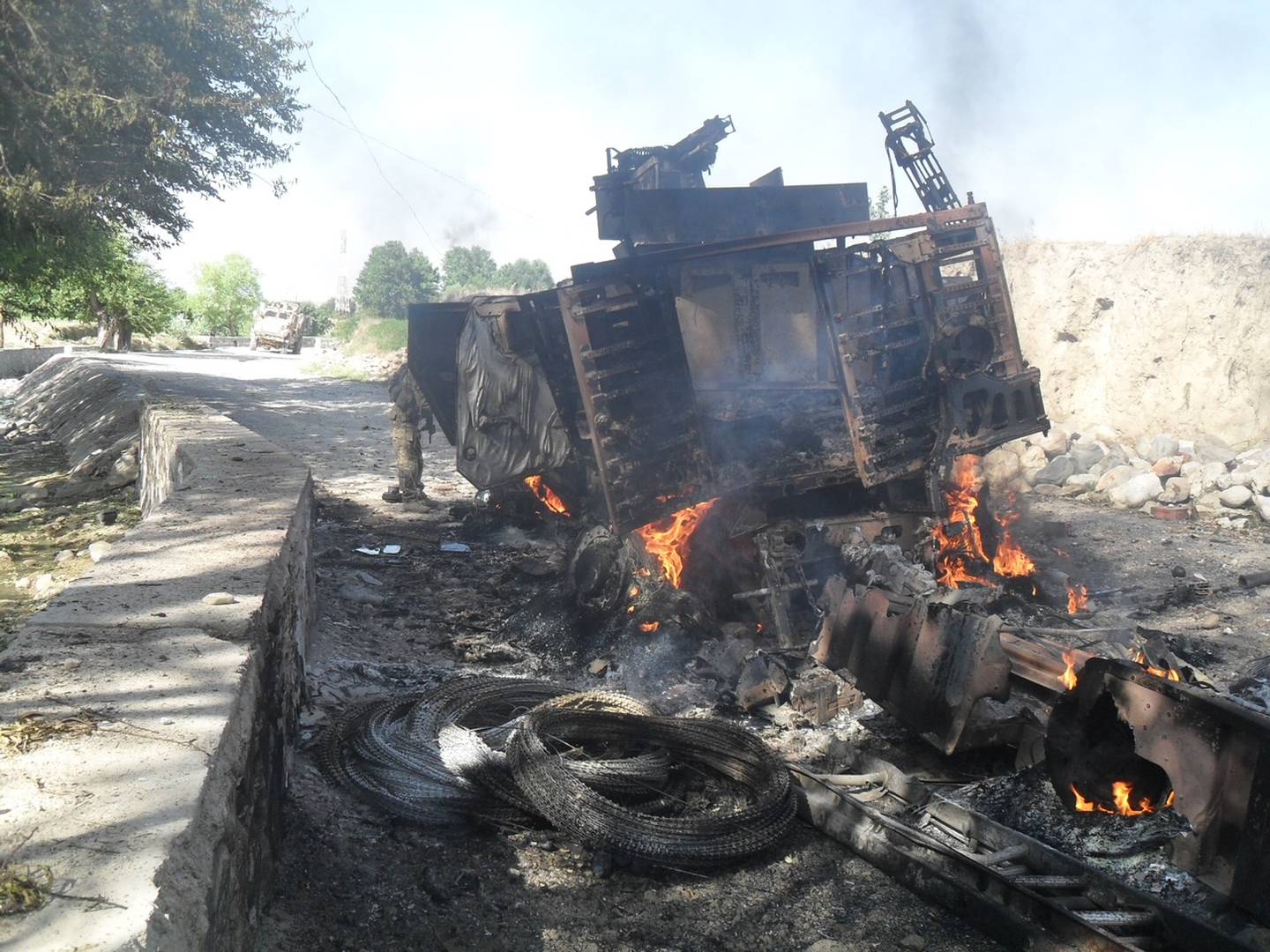 Victor Somoza was riding in this all-terrain vehicle with four other soldiers when it rolled over explosives in Afghanistan on June 7, 2013. One soldier died.