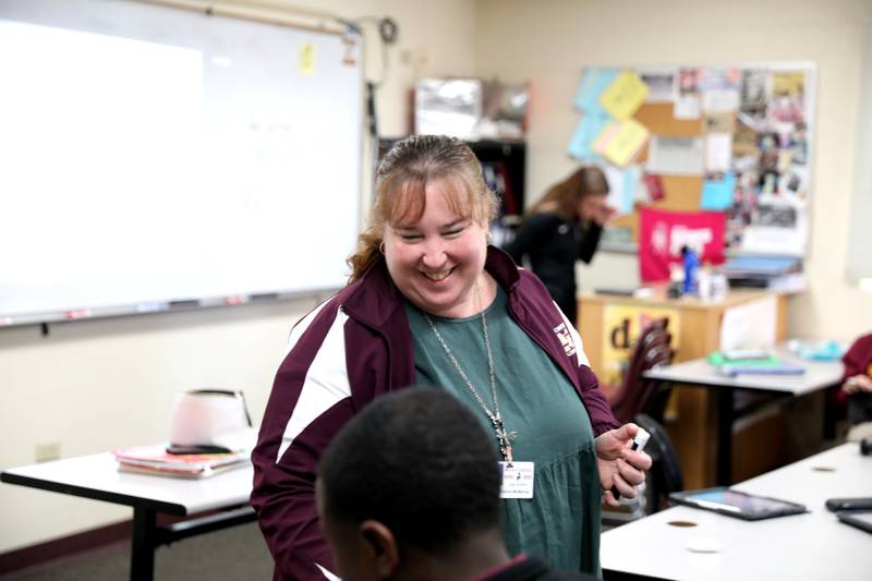 Montini math teacher Chrissy McManus teaches an honors algebra II class at the Lombard school. McManus is the staff sponsor of the Montini math team, who recently made history by bringing home the school’s first Illinois Council of Teachers of Mathematics Regional Championship trophy.