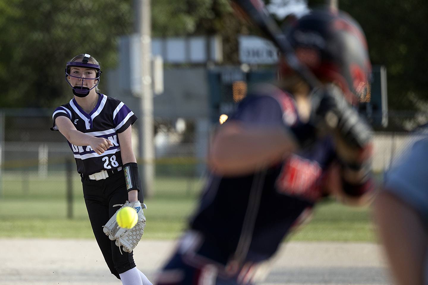 Dixon’s Allie Abell fires a pitch against Belvidere North Tuesday, May 27, 2025, during a Class 3A Regional softball game in Dixon.