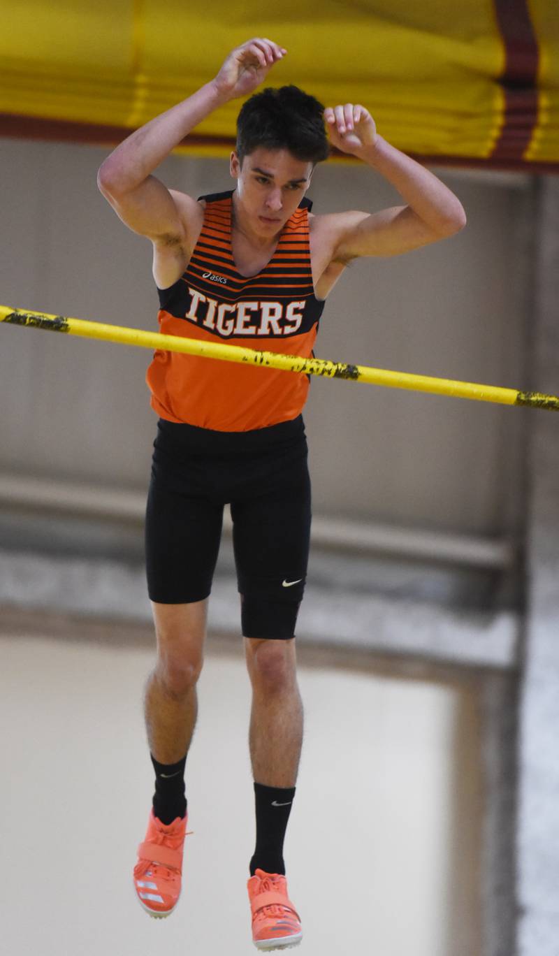 Wheaton Warrenville South’s Luke Richards competes in pole vault during the DuKane boys indoor track meet at Batavia High School Saturday.