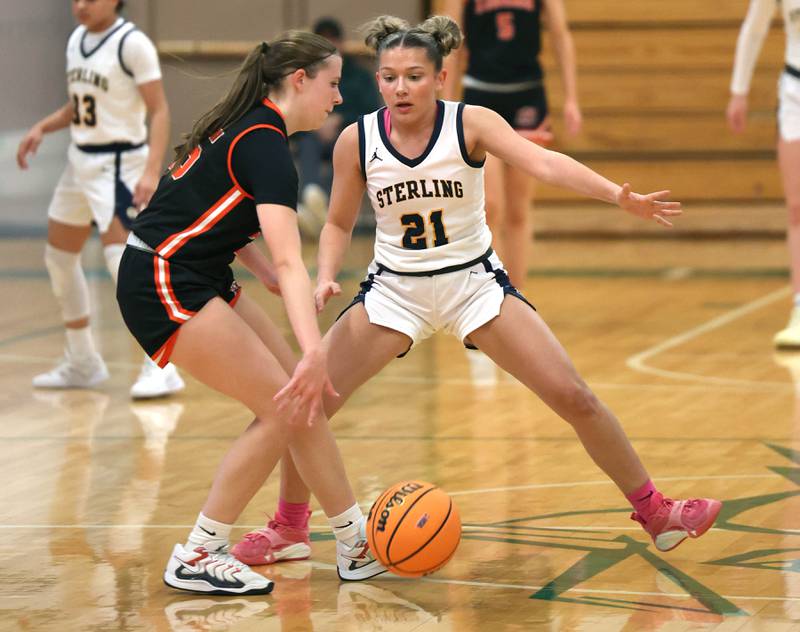 Sterling's Jae James plays defense against Crystal Lake Central's Katelyn Hallum during their Class 3A sectional semifinal game Tuesday, Feb. 25, 2025, at Boylan Catholic High School in Rockford.
