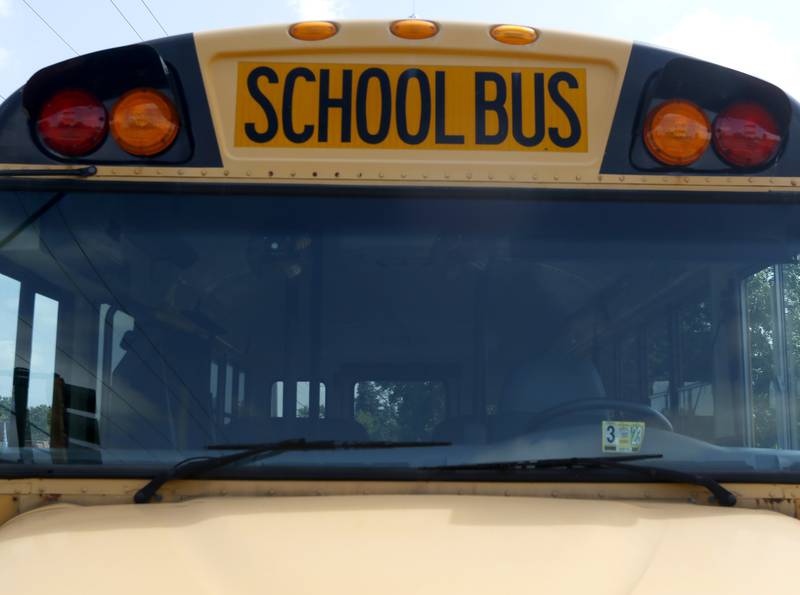 A school bus parked near Northwood Middle School in Woodstock on Friday, July 25, 2023.