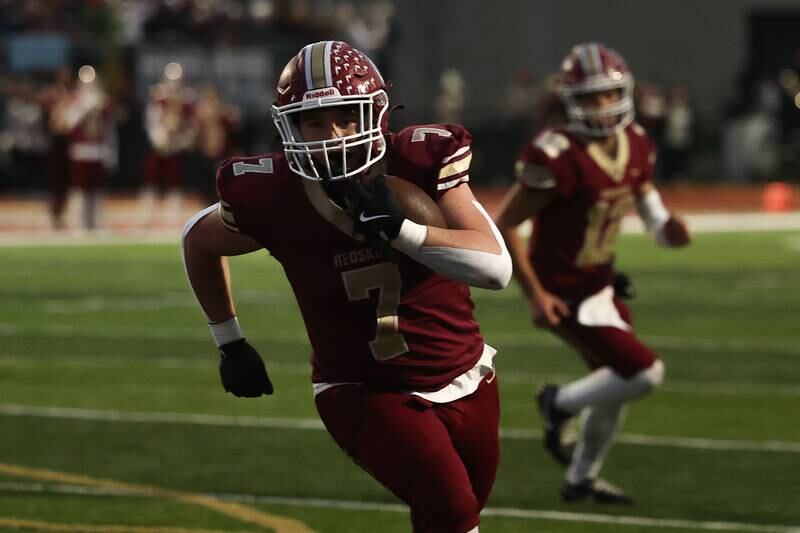 Morris’ Griffin Zweeres runs in for the two point conversion against Highland on Saturday, Nov. 9, 2024 in Morris.