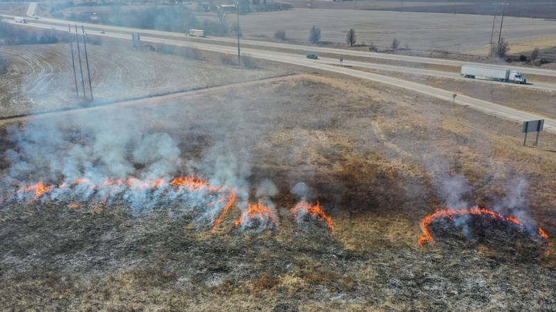 Crews from Semper FI Land Services. along with the help from the Illinois Department of Transportation, conduct a controlled burn at Deer Pit Prairie near the intersection of Interstate 39 and Illinois Route 251 on Monday, Feb. 10, 2025 near Oglesby. The burns are designed to clear out invasive plants and encourage the growth of native prairie vegetation. Other locations that IDOT has another scheduled future burns are Indian Boundary Prairie near Ohio in Bureau County.