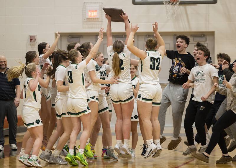 River Ridge celebrates their win over Newman Thursday, Feb. 20, 2025, during the Class 1A girls basketball regional at Forreston.