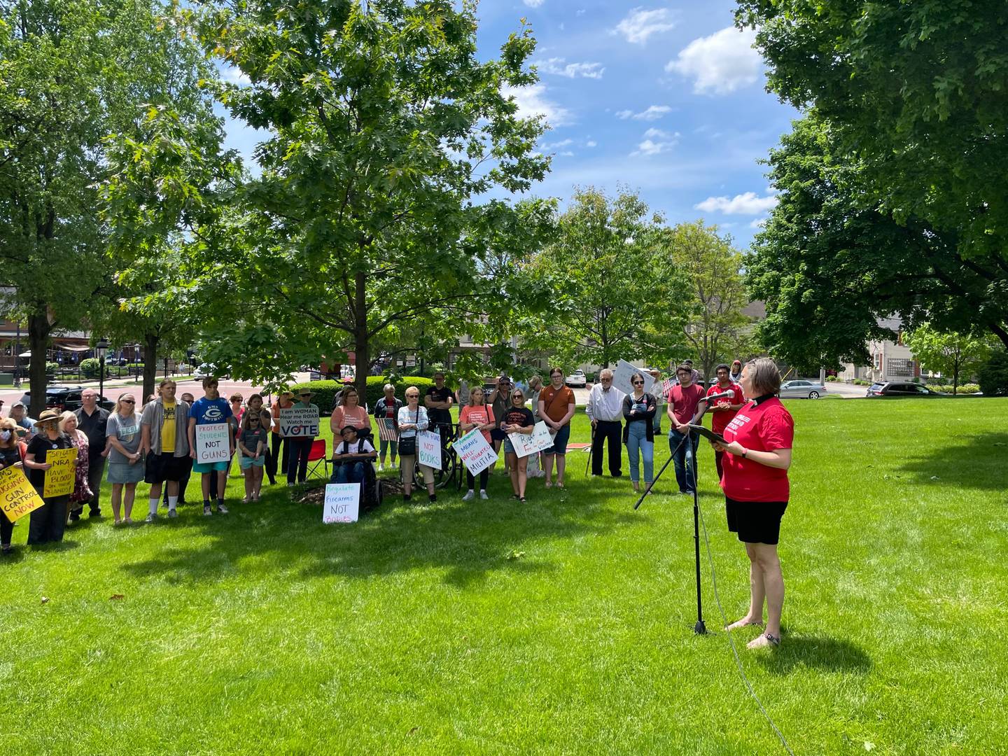 Stephanie Anthony, pastor of Fox Valley Presbyterian Church, reads aloud the names of the 21 victims of the Uvalde, Texas school shooting at a rally against gun violence in Geneva on Saturday.