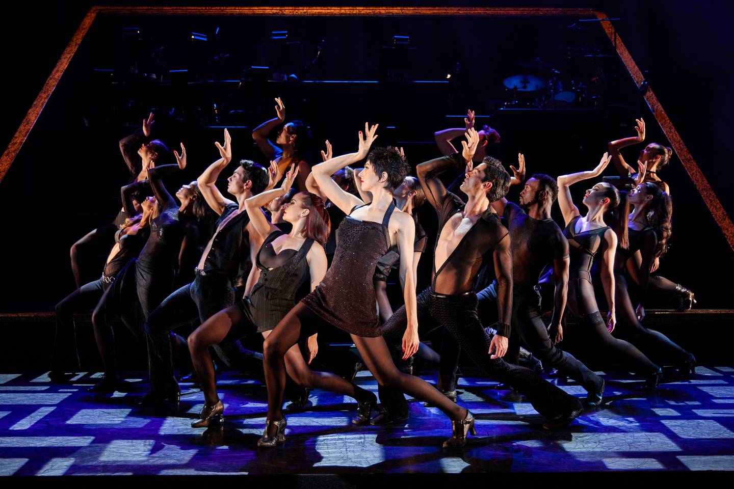 Logan Floyd (foreground) and the company of the musical "Chicago."