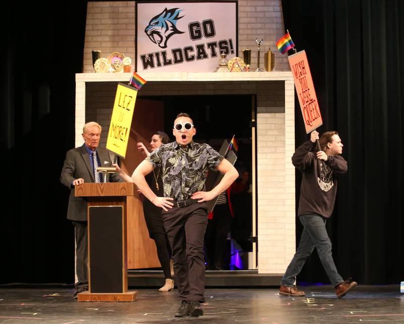 Barry Glickman (center) played by Matt Valle, storms into a PTA meeting as Principal Hawkins (left) played by Don Grant Zellmer and Trent Oliver (right) played by Jake Jakielski act out a scene during a rehearsal of "The Prom" on Wednesday, April 19, 2023 at IVCC in Oglesby.