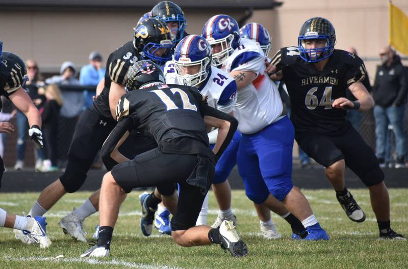 The Durand-Pecatonica defense swarms to the ball against Genoa-Kingston on Saturday, November 2, 2024, in a Class 3A first-round playoff game.