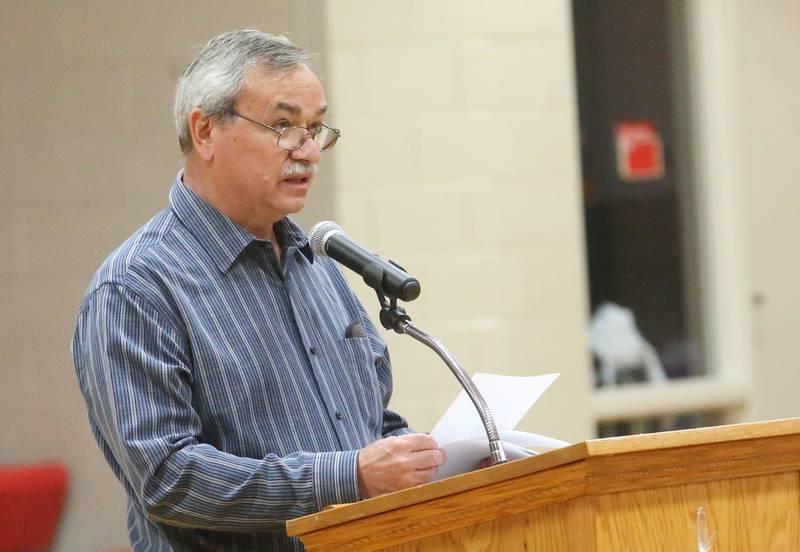 Village of Ladd historian Jim Piacenti speaks during an unveiling ceremony of a 1890 school bell on Monday, May 19, 2025 at Ladd Grade School.