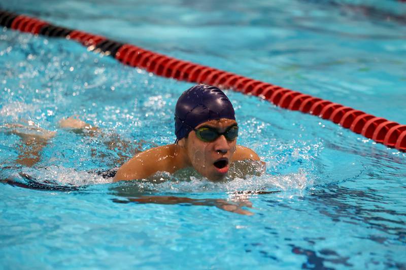 Bishop McNamara's Luis Espinosa competes in the 200-yard individual medley race during the All-City meet on Tuesday, Jan. 6, 2026.