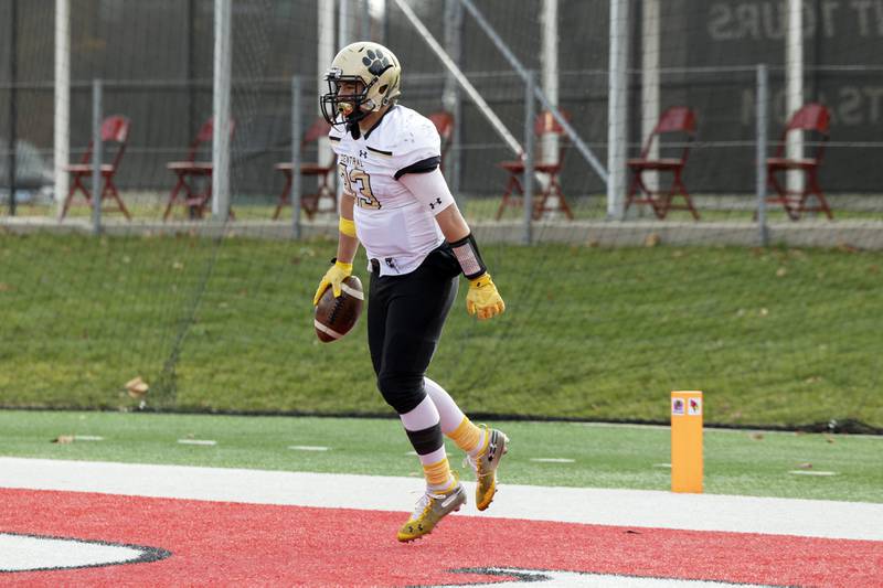 Camp Point's Elijah Genenbacher celebrates his TD against Lena-Winslow Friday, Nov. 24, 2023 in the 1A state football championship game at Hancock Stadium in Normal.