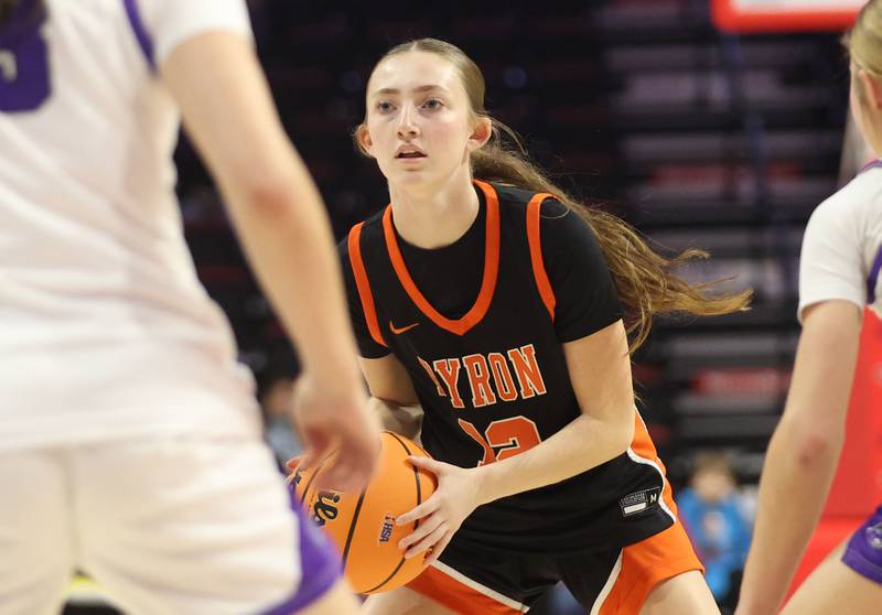 Byron's Cailey Coyne looks to pass the ball inside the lane against Breese Central during the Class 2A title game on Saturday, March 7, 2026 at CEFCU Arena in Normal.