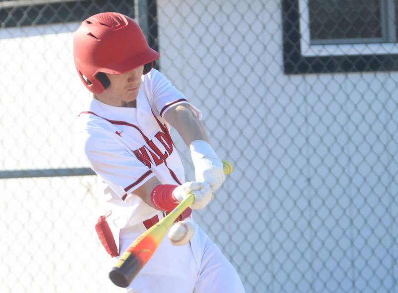 Streator's Keegan Angelico gets a hit against Hall on Thursday, March 19, 2026 at Streator High School.