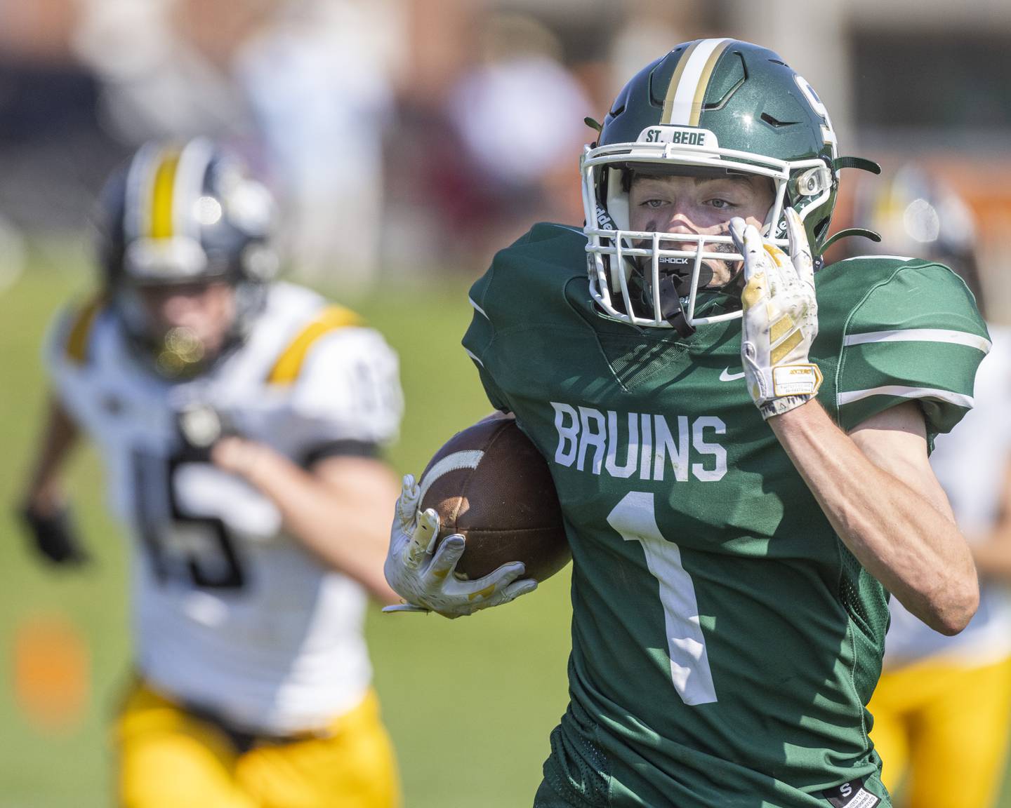 Alex Ankiewicz of St. Bede Academy runs the football down field for a large gain of yards against the Elmwood Park Tigers on September 30, 2023.