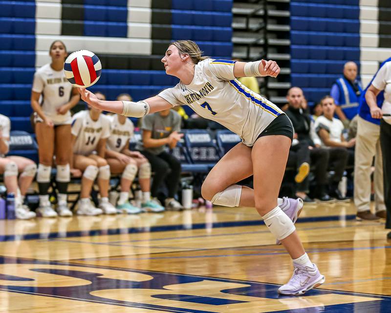 Wheaton North's Mary kate Whittington (7) reaches out for a save during Class 4A Lake Park Regional final volleyball match between Wheaton North at St Charles North.  Oct 31, 2024  in Roselle.