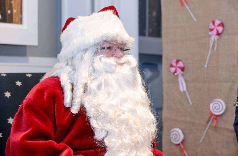 Santa greets children at the Geneva Visitor Center on Saturday, Dec 20, 2025 in Geneva.