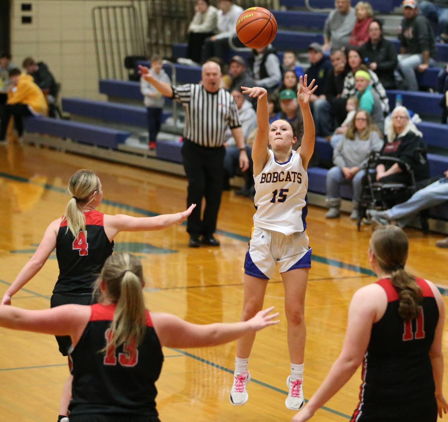 Somonauk's Josie Rader shoots a wide-open jump shot over Earlville in a Little Ten Conference game in Somonauk two seasons ago.