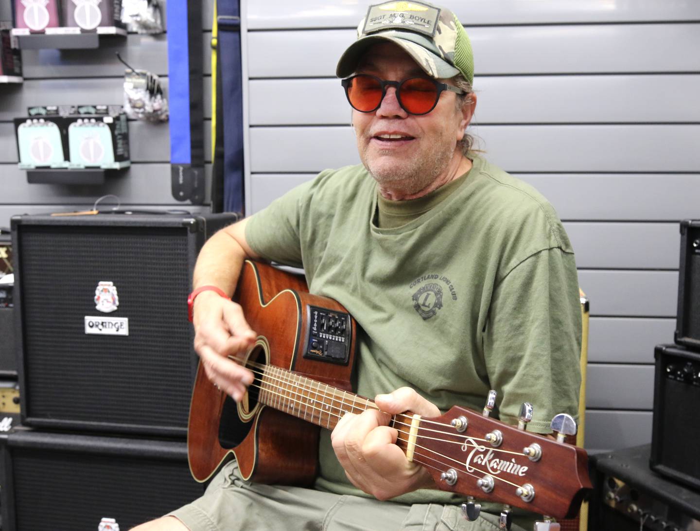 U.S. Marine Corps veteran Marshall Boyle, from DeKalb, plays guitar Friday, Sept. 22, 2023, at Aurora Music Company in DeKalb. Boyle serves as an ambassador to Guitars 4 Vets and volunteers for Habitat for Humanity.