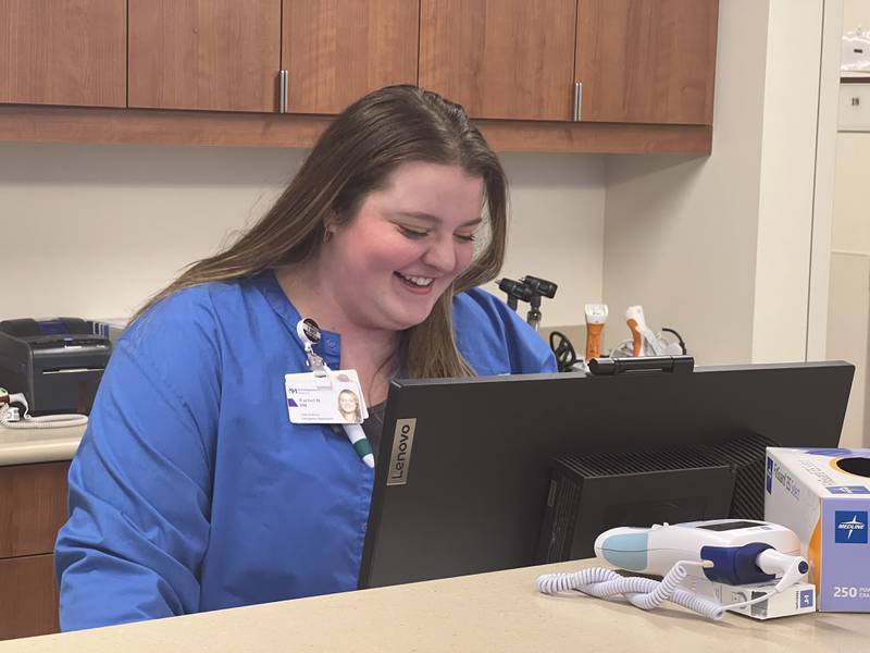 Rachel Nagler, a registered nurse at Northwestern Medicine Kishwaukee Hospital, said she didn't expect to work in the emergency department when she was in nursing school but has taken to liking the job assignment. On April 19, 2024, she began her shift by checking patient records and filling medication.