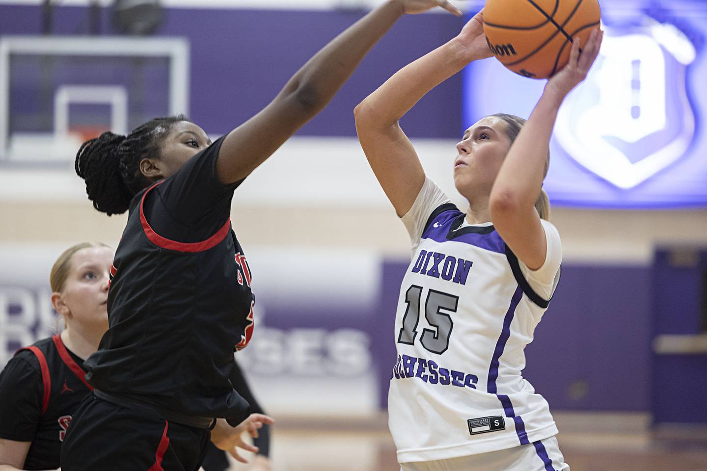 Dixon’s Morgan Hargrave puts up a shot over Stillman Valley’s Dailene Wade Saturday, Feb. 7, 2026.