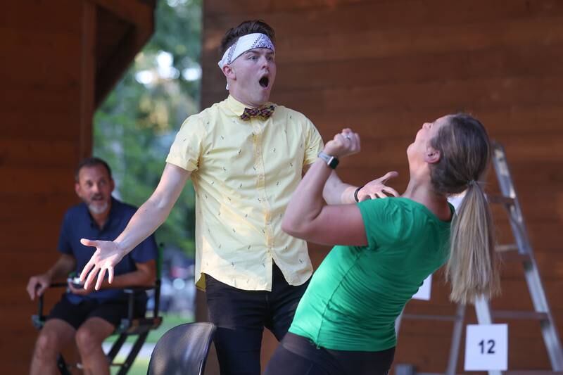 GreenRoom Improv cast members Christian Zierke and Miriam Naponelli do an improv for the show hosted by the Morris Library at Goold Park on Friday, Aug. 11, 2023 in Morris.